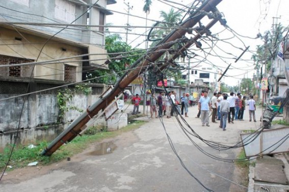 Broken Electric poles risks city dwellers, underground power cable hangs on